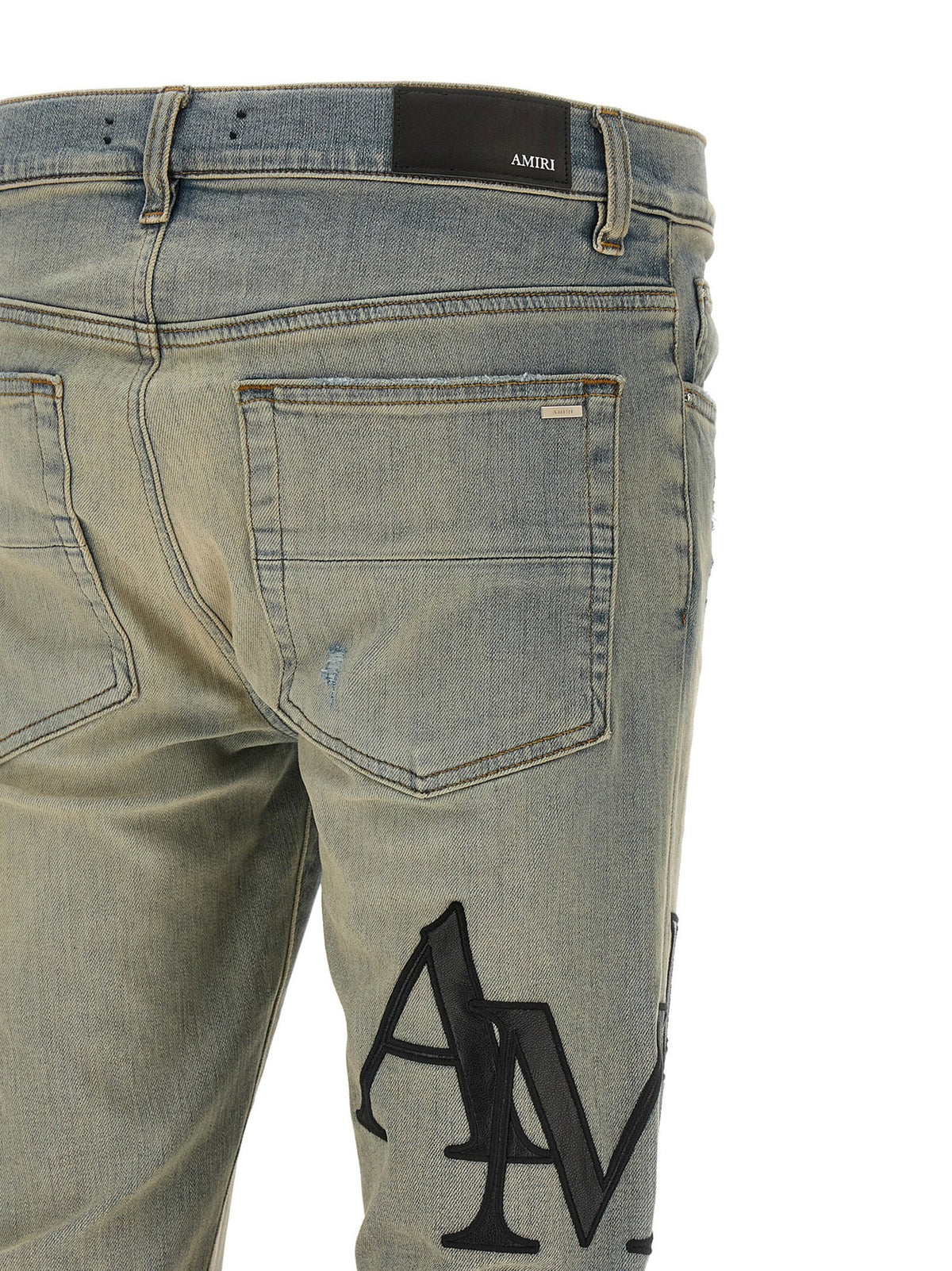 Amiri Staggered Logo Jeans — Blue